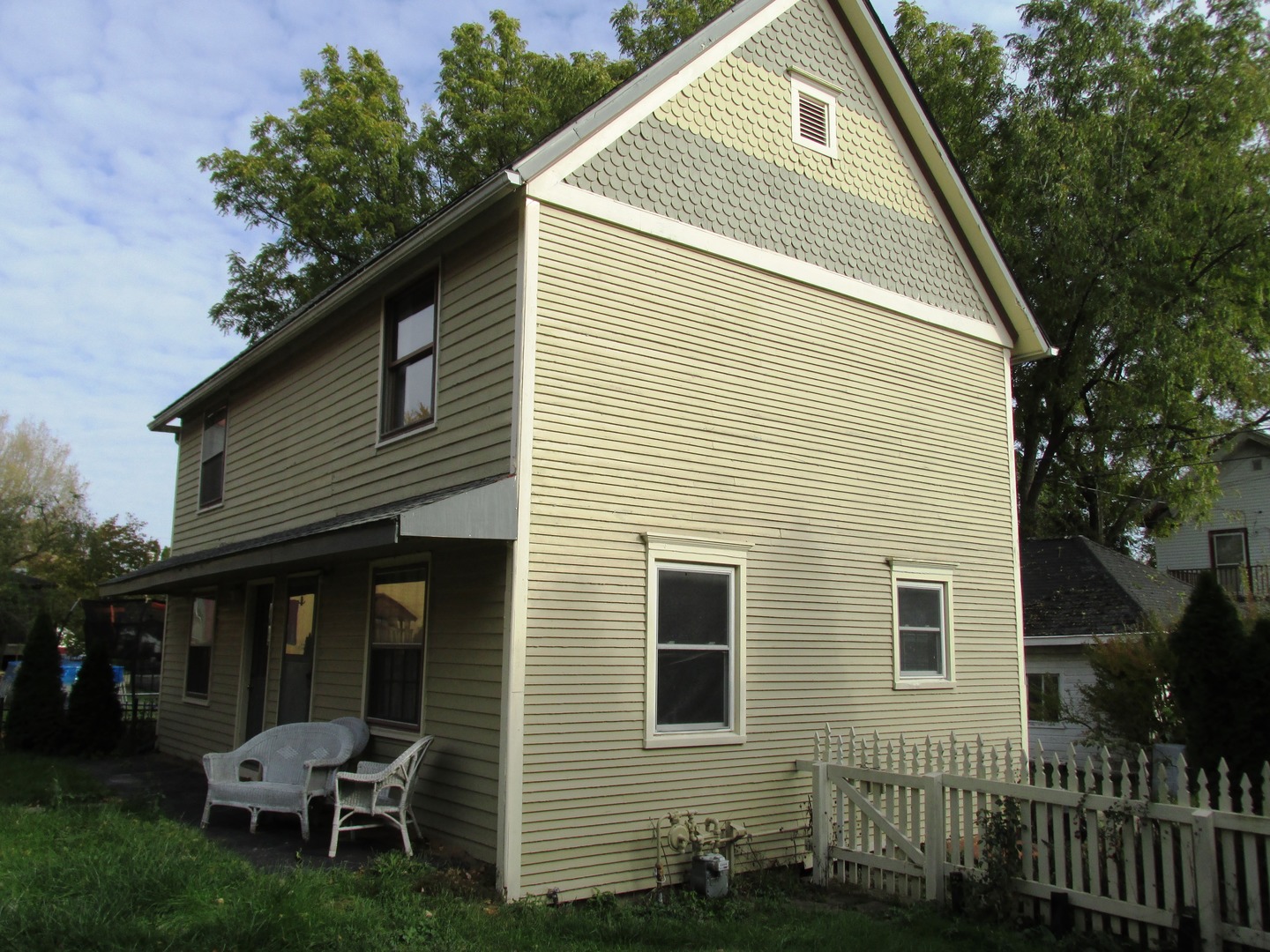 603 North 8th Street Rochelle, IL 61068 - Photo 30 of 33 a view of a wooden house with a yard