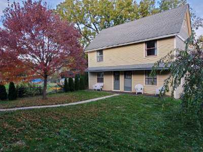 603 North 8th Street Rochelle, IL 61068 - Photo 32 of 33 a front view of a house with a garden