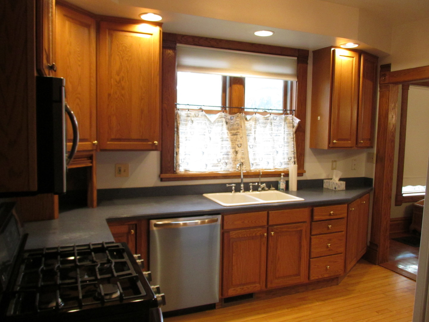 603 North 8th Street Rochelle, IL 61068 - Photo 10 of 33 a kitchen with a sink stove top oven and cabinets