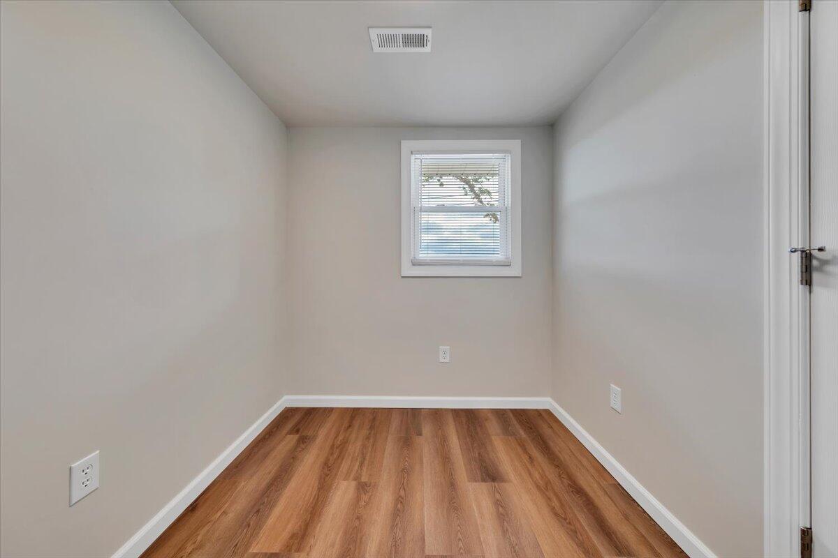 7153 Peppers Ferry Road Max Meadows, VA 24360 - Photo 23 of 67 a view of a room with wooden floor and window