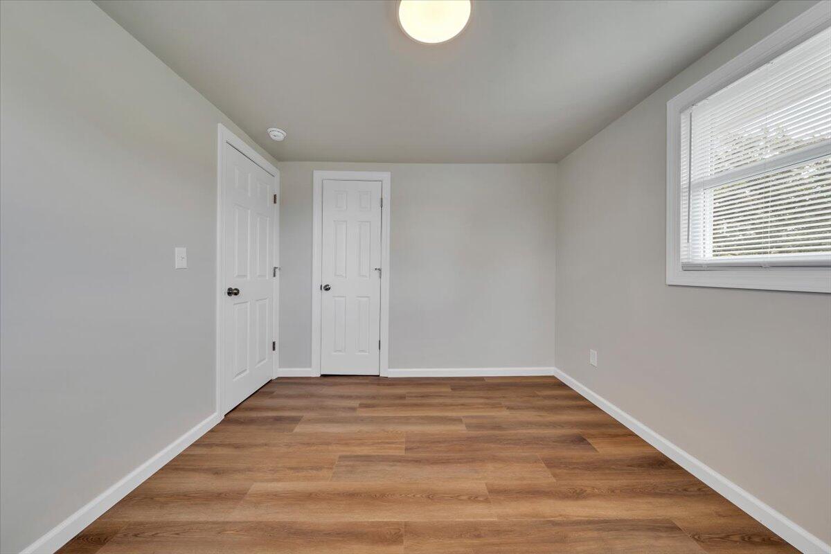 7153 Peppers Ferry Road Max Meadows, VA 24360 - Photo 28 of 67 a view of room with window and hardwood floor