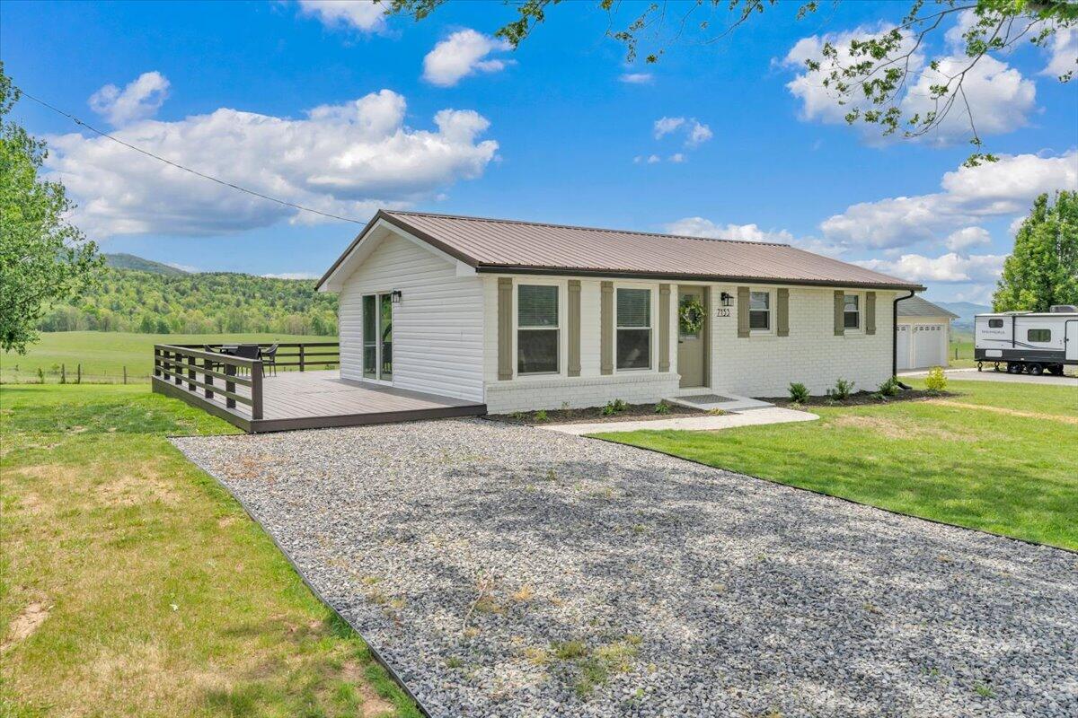7153 Peppers Ferry Road Max Meadows, VA 24360 - Photo 3 of 67 a view of house with backyard and garden