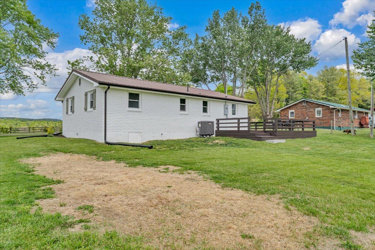7153 Peppers Ferry Road Max Meadows, VA 24360 - Photo 35 of 67 a house view with a garden space