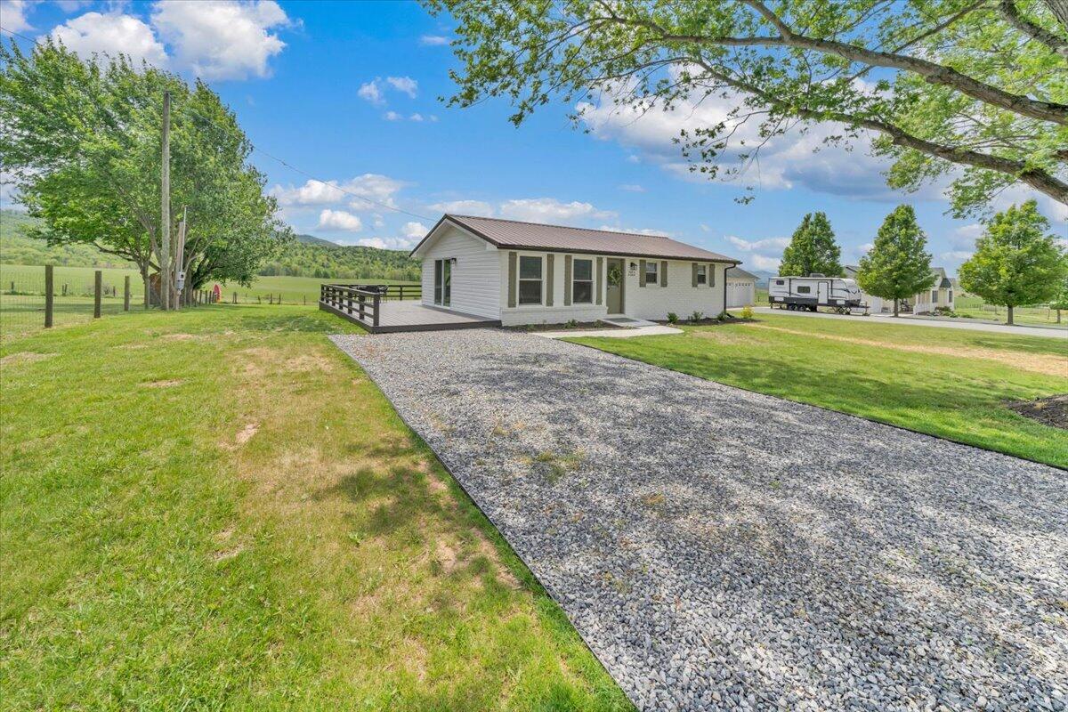 7153 Peppers Ferry Road Max Meadows, VA 24360 - Photo 39 of 67 a front view of house with yard and green space