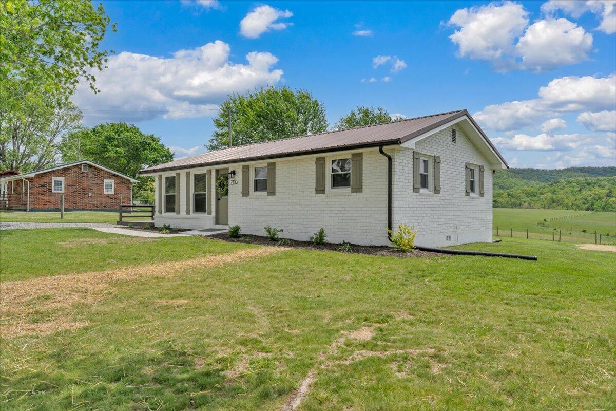 7153 Peppers Ferry Road Max Meadows, VA 24360 - Photo 42 of 67 a front view of house with yard and green space