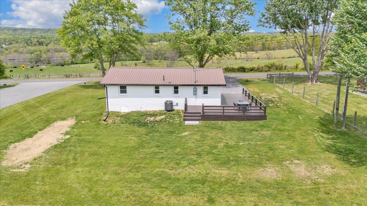 7153 Peppers Ferry Road Max Meadows, VA 24360 - Photo 49 of 67 a aerial view of a house with a yard and lake view