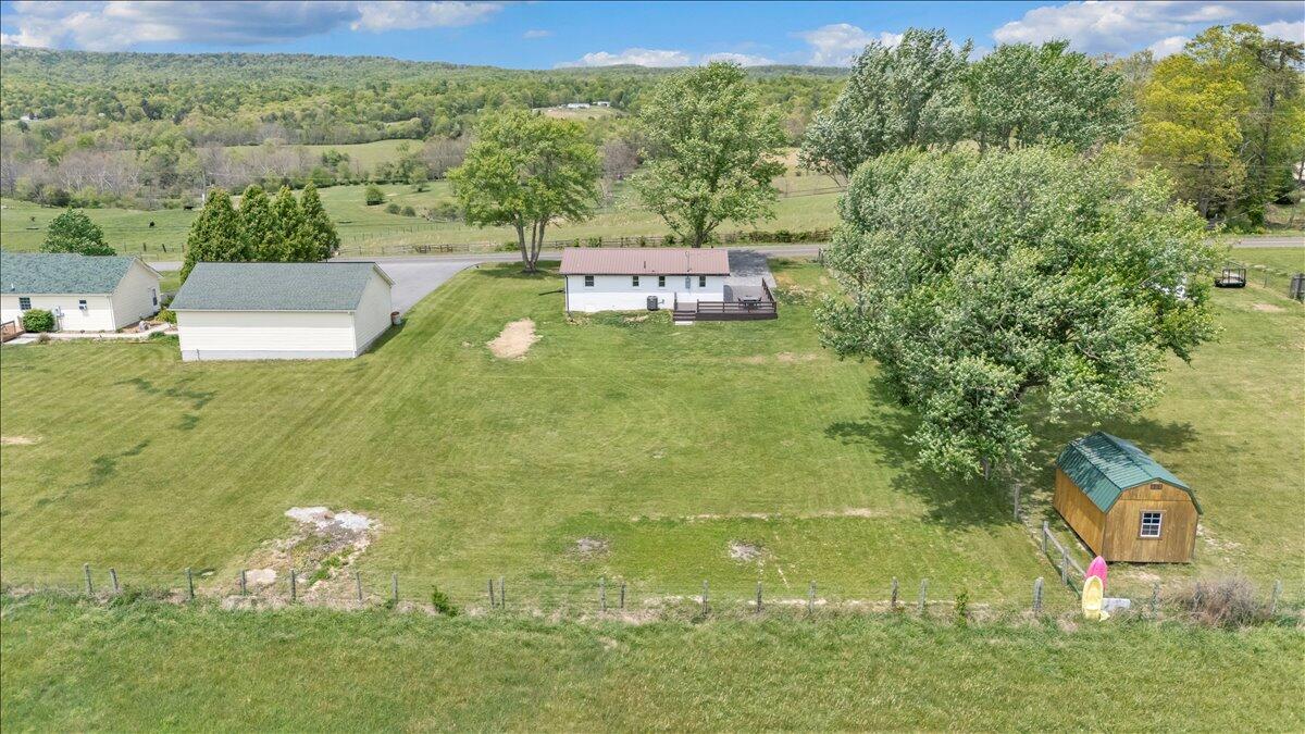 7153 Peppers Ferry Road Max Meadows, VA 24360 - Photo 51 of 67 a aerial view of a house with a yard