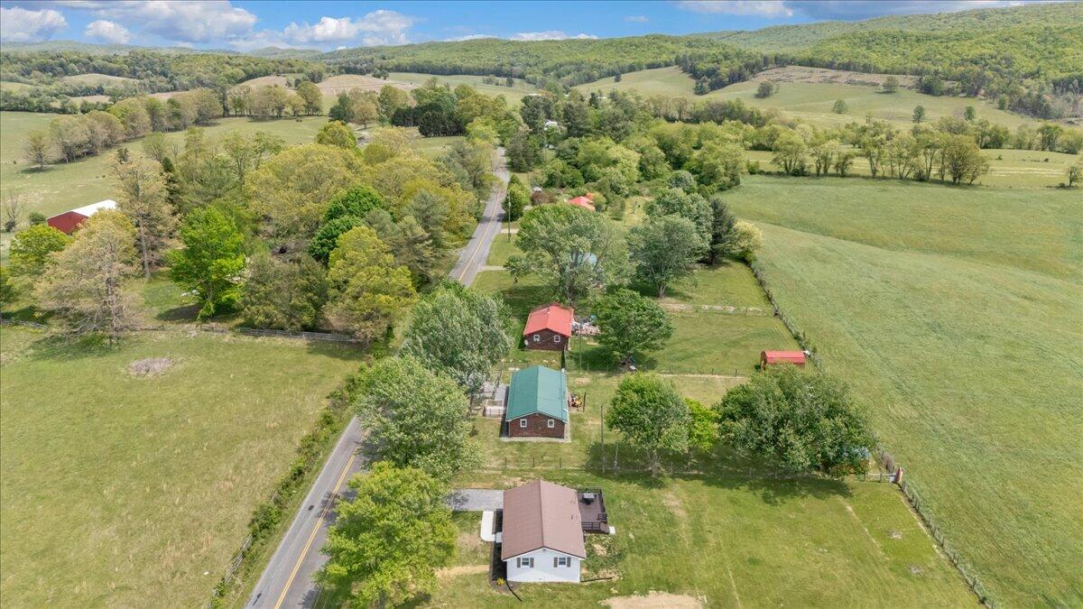 7153 Peppers Ferry Road Max Meadows, VA 24360 - Photo 56 of 67 a aerial view of residential houses with outdoor space and river
