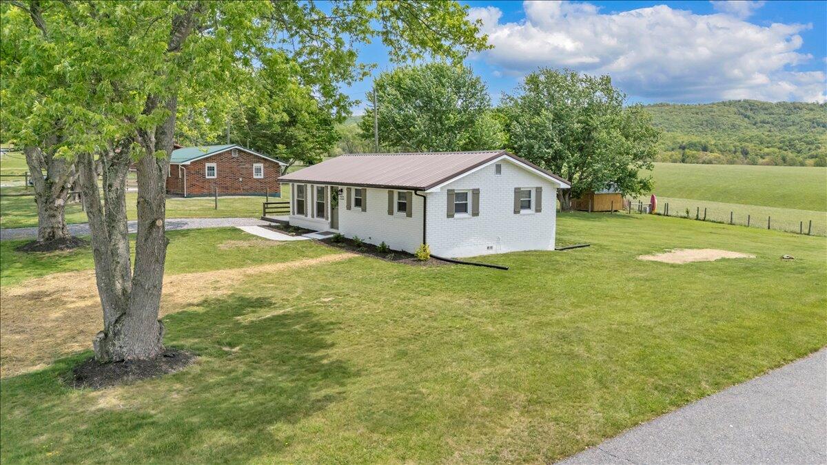 7153 Peppers Ferry Road Max Meadows, VA 24360 - Photo 58 of 67 a view of house with garden