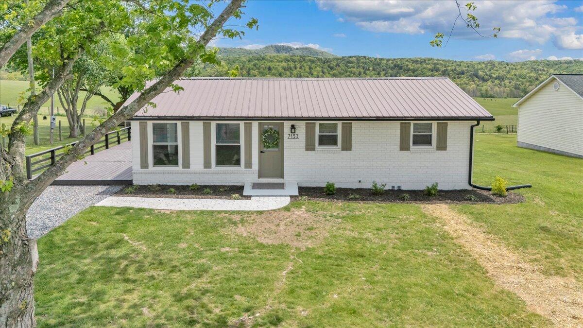 7153 Peppers Ferry Road Max Meadows, VA 24360 - Photo 59 of 67 front view of a house with a yard