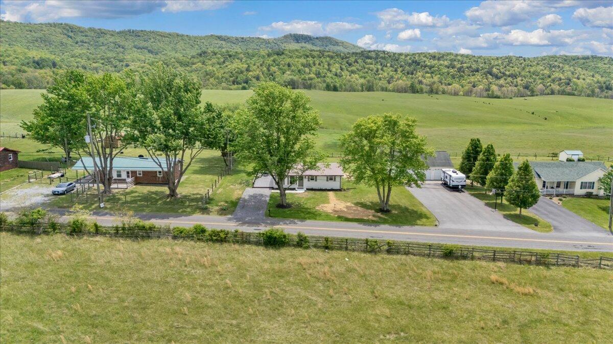 7153 Peppers Ferry Road Max Meadows, VA 24360 - Photo 64 of 67 a view of a lake with a yard