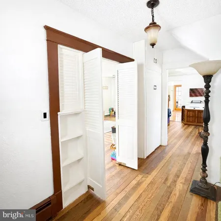 a view of livingroom with furniture and wooden floor