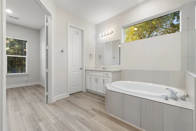 a view of bathroom with dual sinks