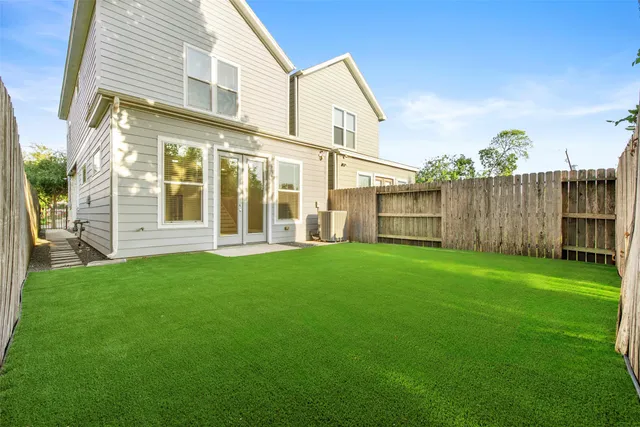 a view of a back yard of the house