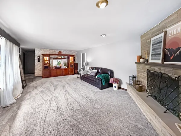 a bed room with a bed and a television