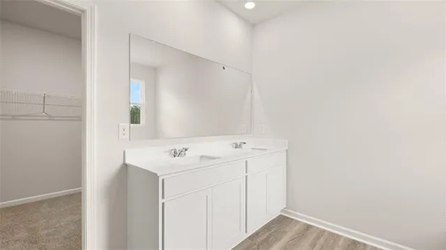 a bathroom with a tub and shower