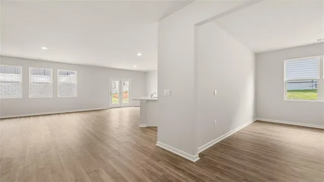 a kitchen with stainless steel appliances a refrigerator sink and cabinets