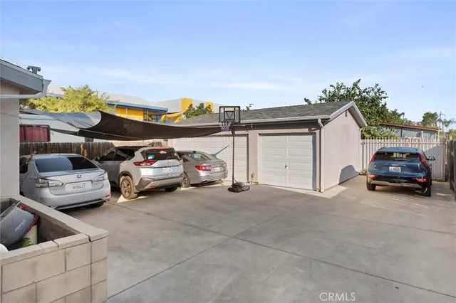 a view of car parked in front of house