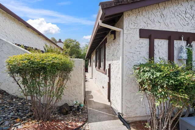 a view of a wooden door of the house