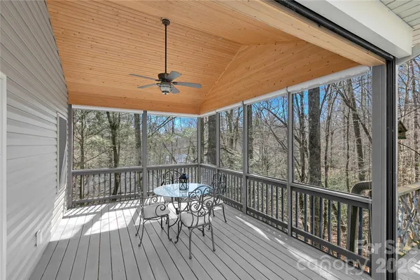 a view of balcony with furniture
