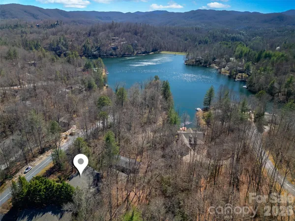 an aerial view of residential house with outdoor space and river