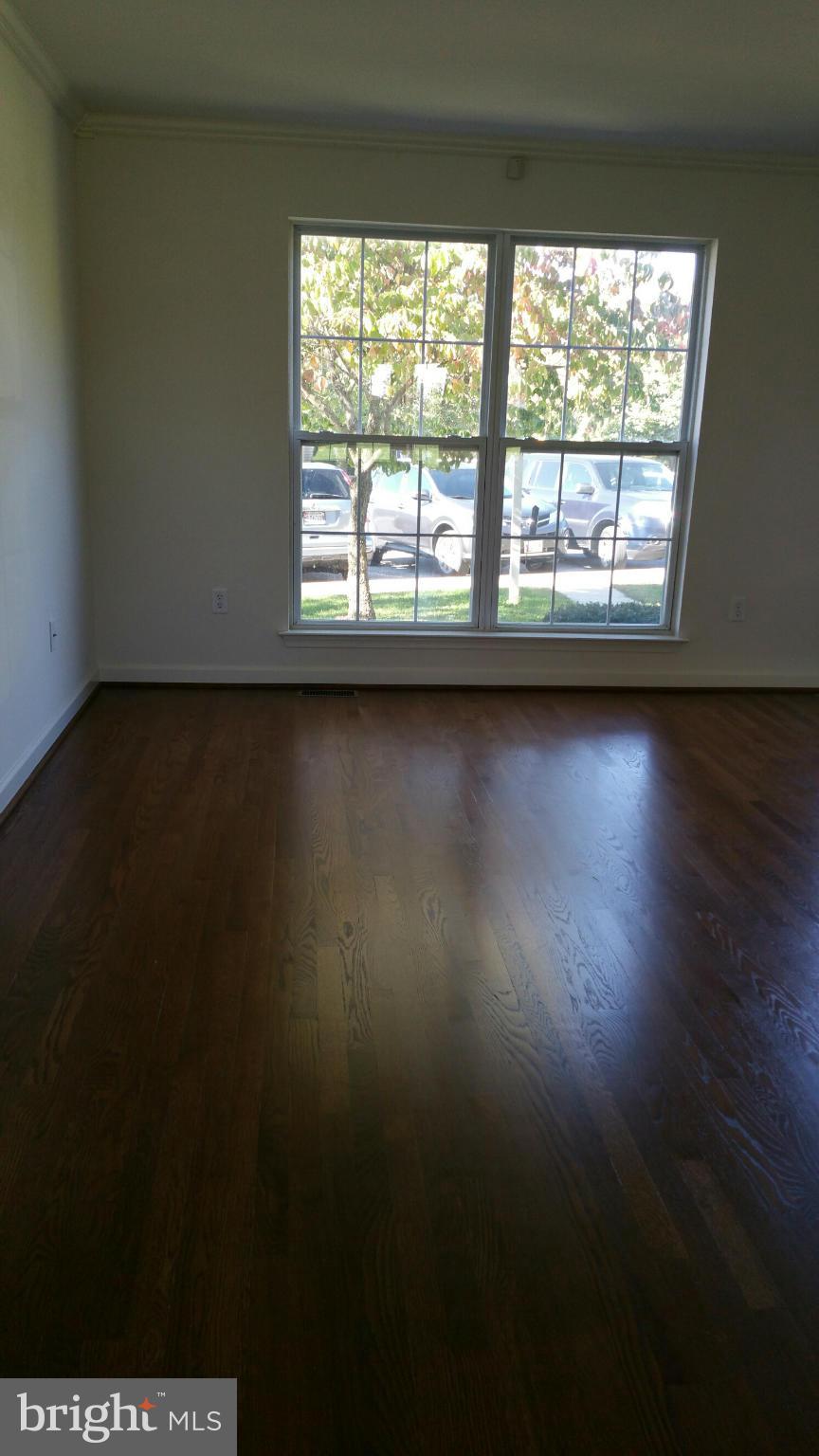 9237 Ridgefield Circle Frederick, MD 21701 - Photo 2 of 20 Living Room from kitchen towards picture window
