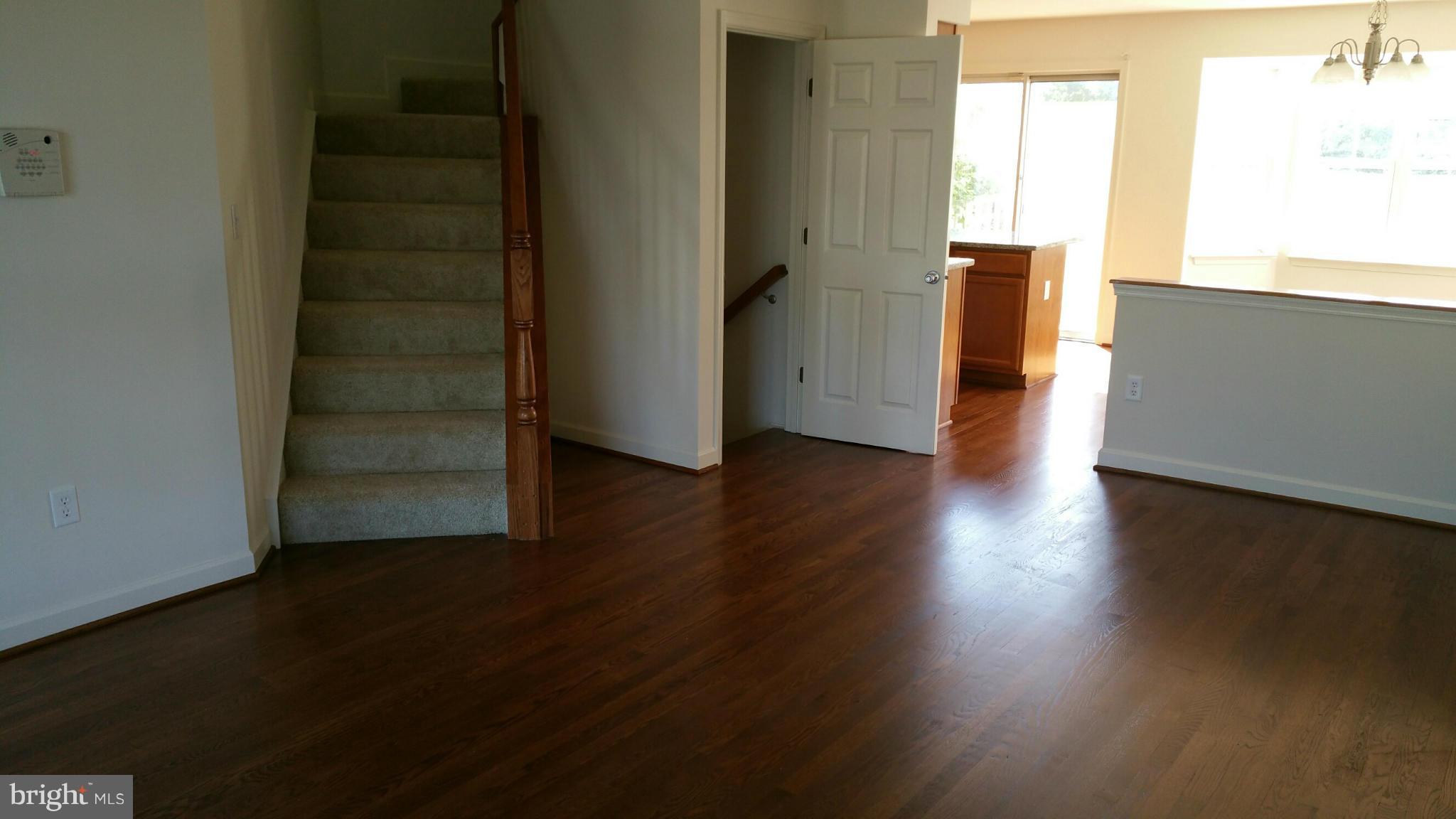9237 Ridgefield Circle Frederick, MD 21701 - Photo 3 of 20 LR w/ wood floors to dining and kitchen