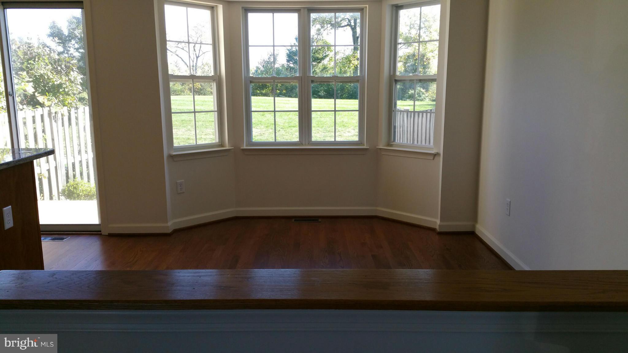 9237 Ridgefield Circle Frederick, MD 21701 - Photo 6 of 20 Dining Room bow window looks out to farm