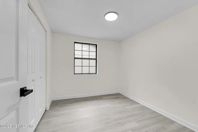 an empty room with windows