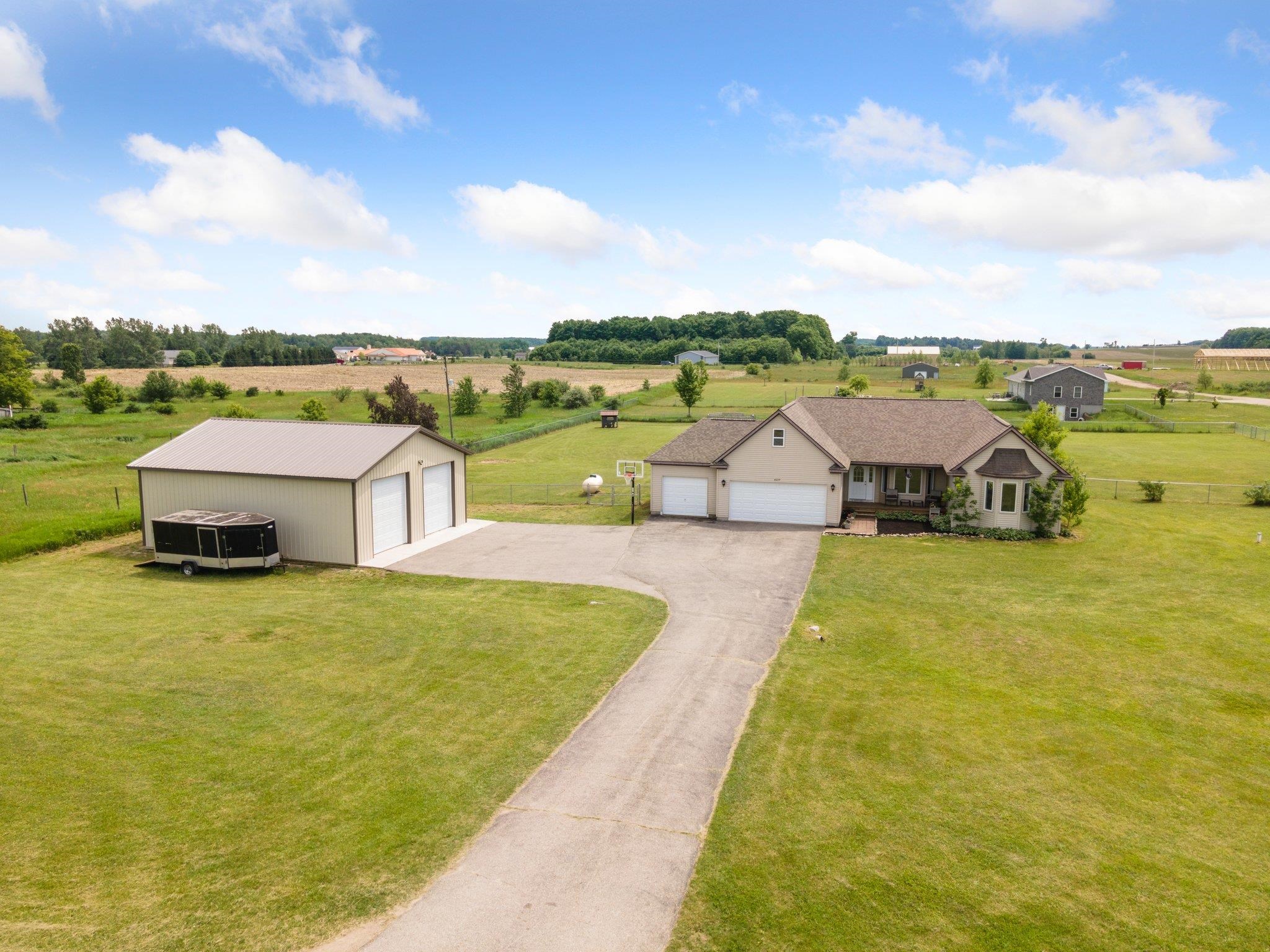 4277 Hamlin Road Grawn, MI 49637 - Photo 1 of 58