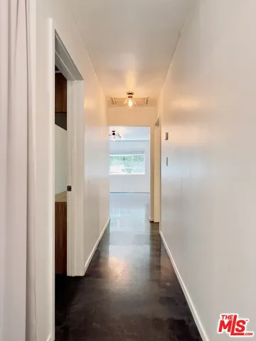 an empty room with a bench