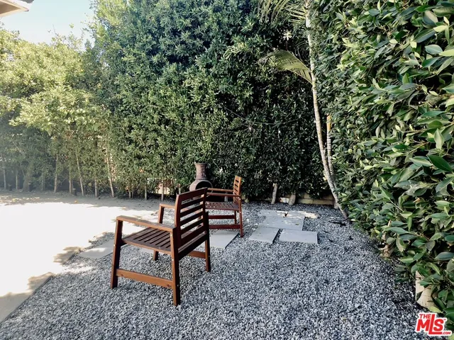 a sign board with yard