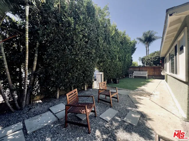 a view of a street with a house