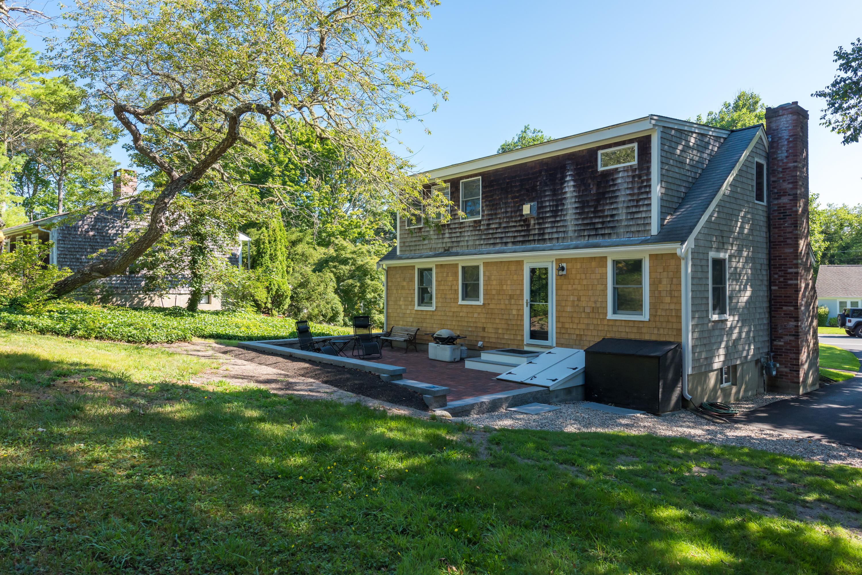 59 Nob Hill Road Chatham, MA 02633 - Photo 20 of 24 a view of a house with a yard