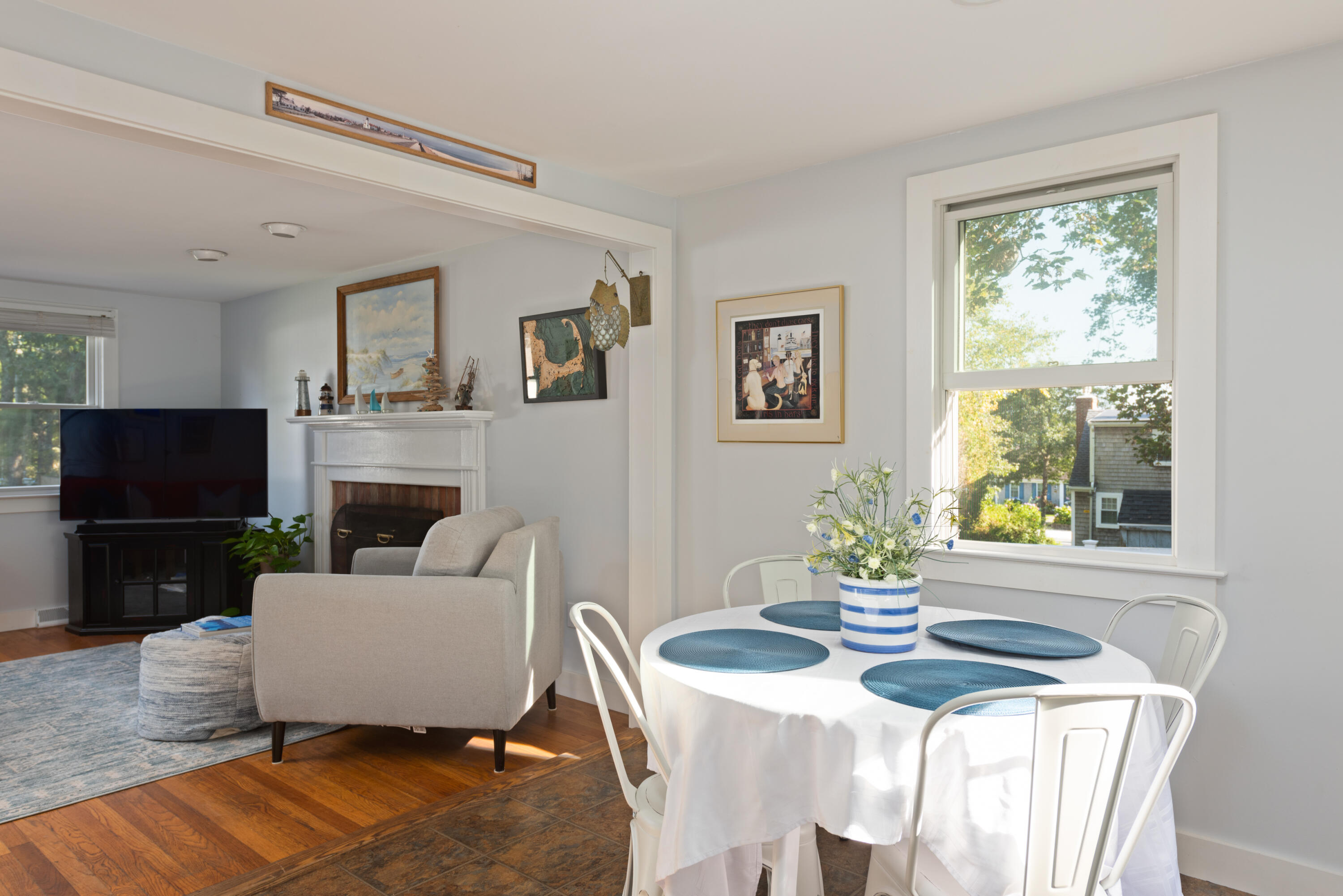 59 Nob Hill Road Chatham, MA 02633 - Photo 7 of 24 a living room with fireplace furniture and a flat screen tv