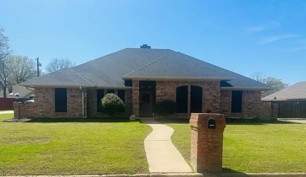 a view of a house with swimming pool