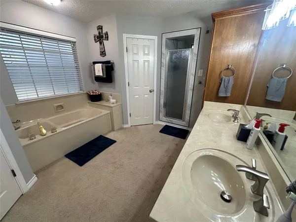 a bathroom with a toilet sink and vanity