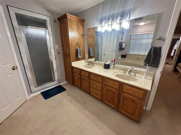 a kitchen with stainless steel appliances granite countertop a stove and a refrigerator