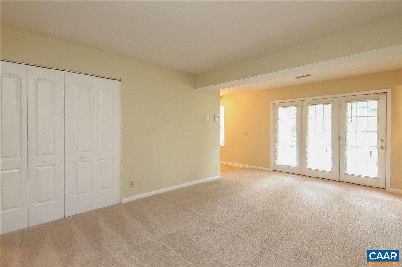 1254 Villa Lane, Unit A Charlottesville, VA 22903 - Photo 2 of 10 a view of an empty room with a window
