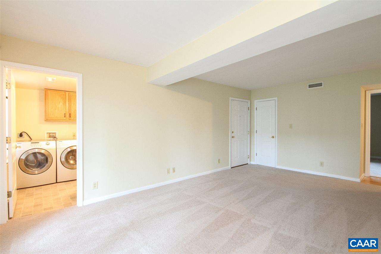 1254 Villa Lane, Unit A Charlottesville, VA 22903 - Photo 6 of 10 a view of a storage & utility room with washer and dryer