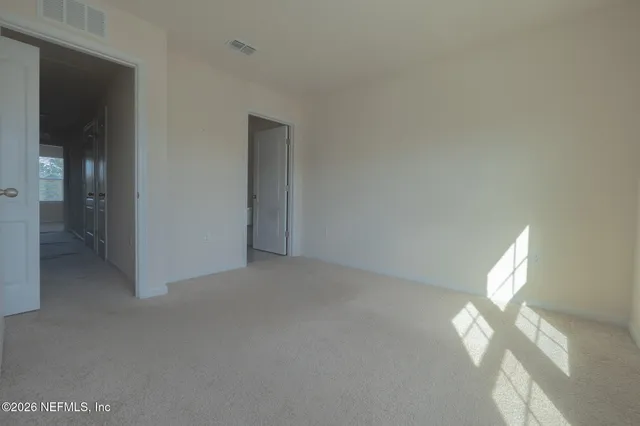 a bathroom with a granite countertop sink toilet and bathtub