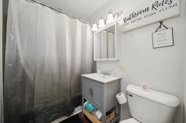 a view of bathroom with a washer and dryer