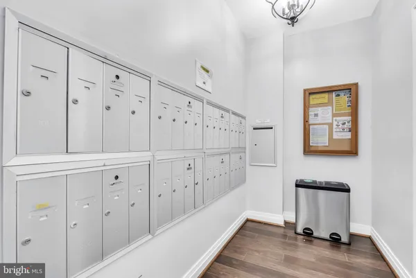 a room with gym equipment and a large window