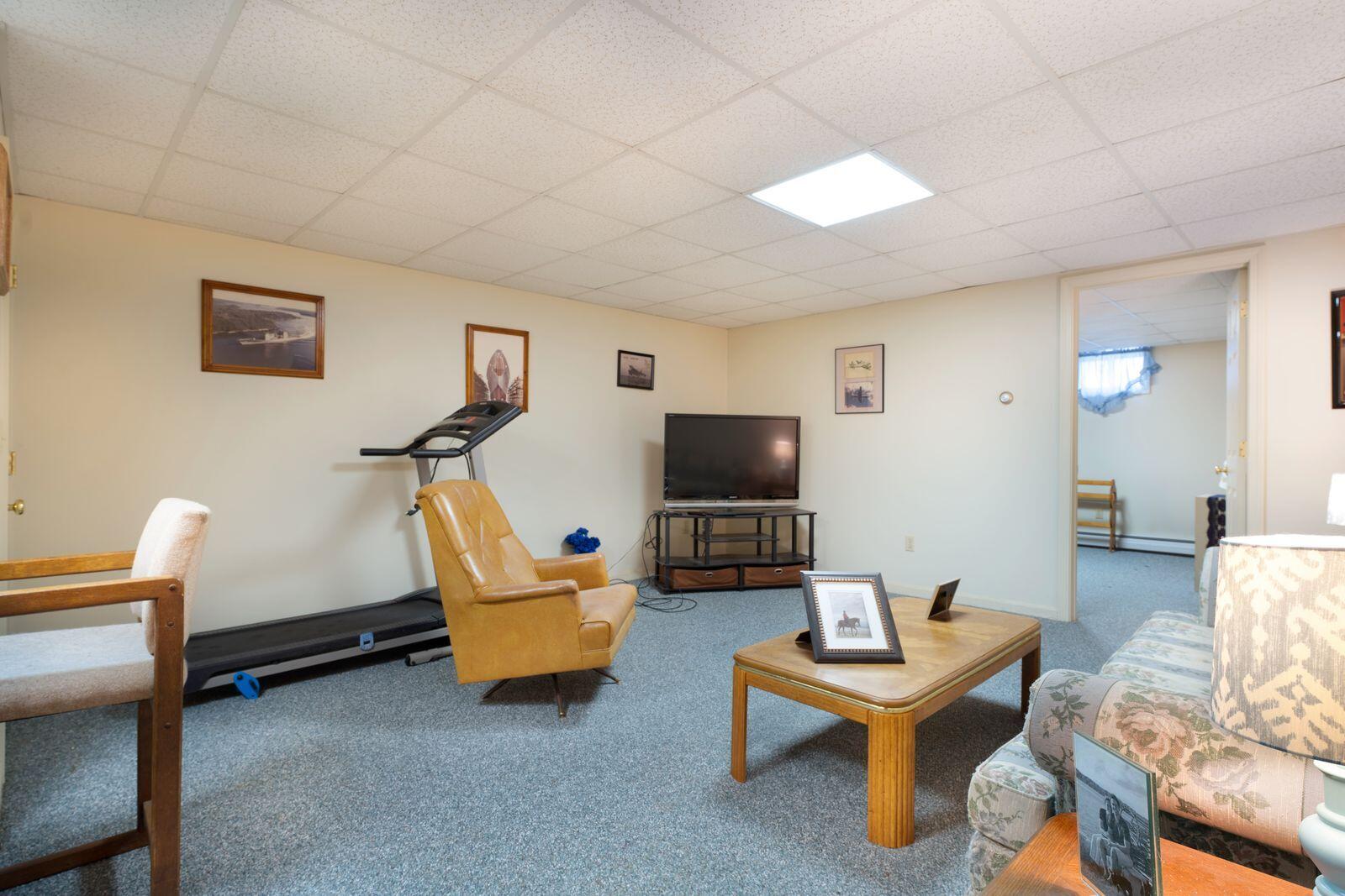 21 Kyle Street Brunswick, ME 04011 - Photo 20 of 28 21 kyle bsmnt rec room