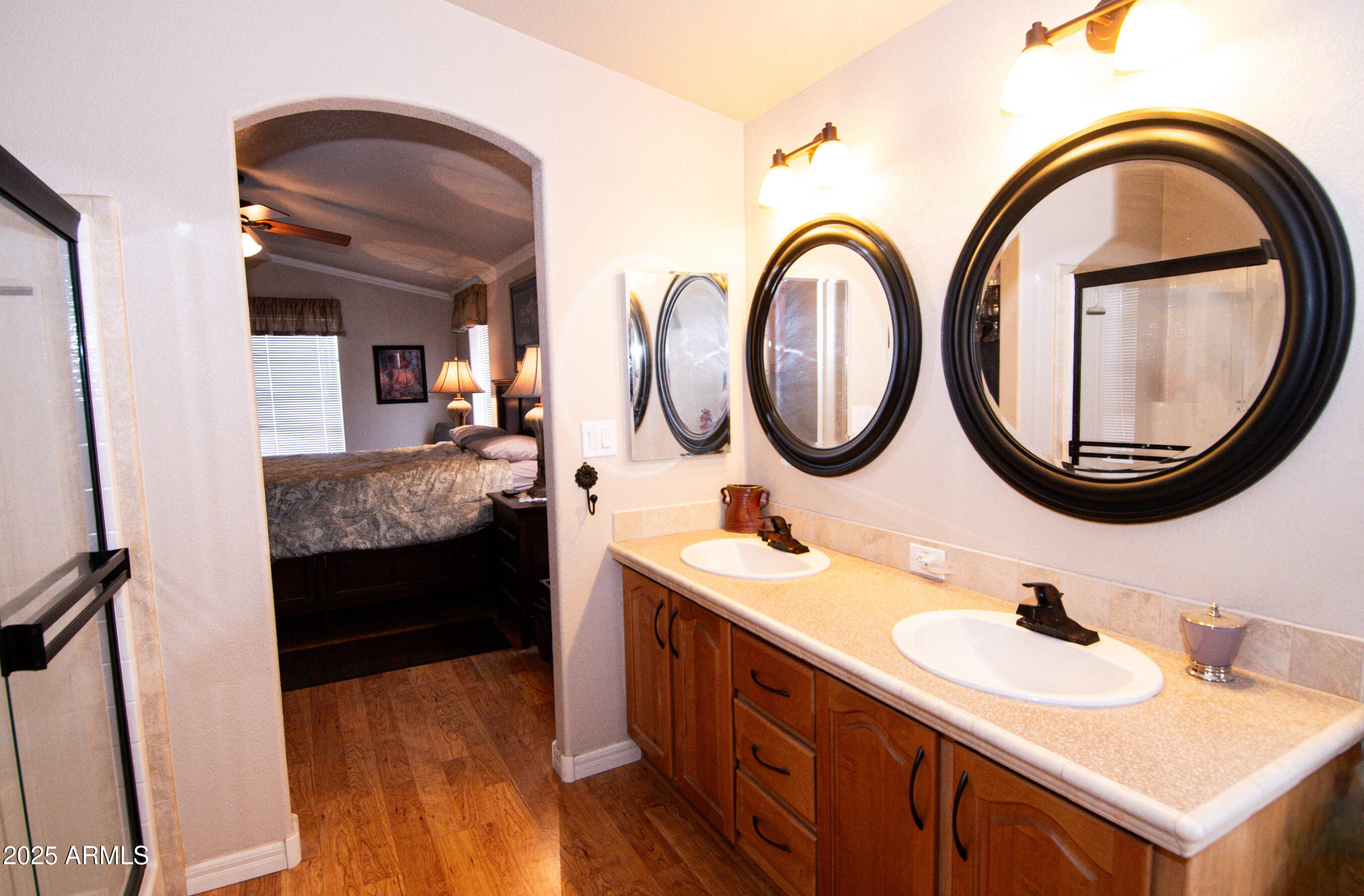 61 County Rd N6379 St. Johns, AZ 85936 - Photo 21 of 33 a bathroom with a granite countertop double vanity and a mirror