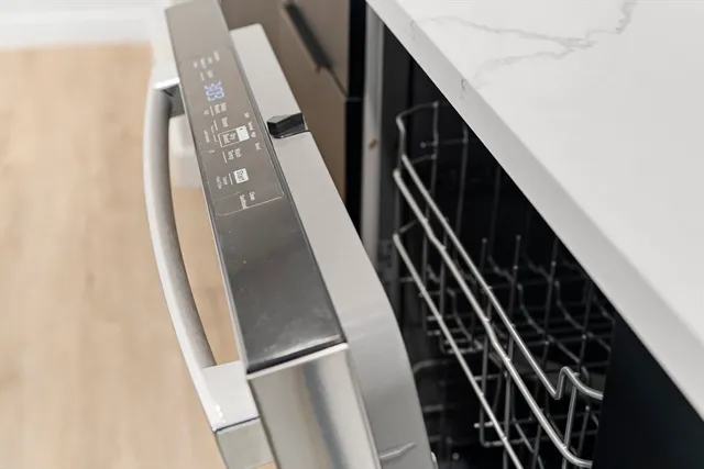 a close view of water heater and stairs