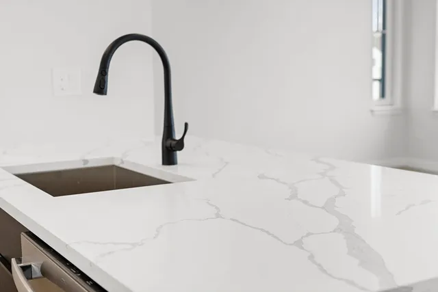 a view of a room with window and workspace