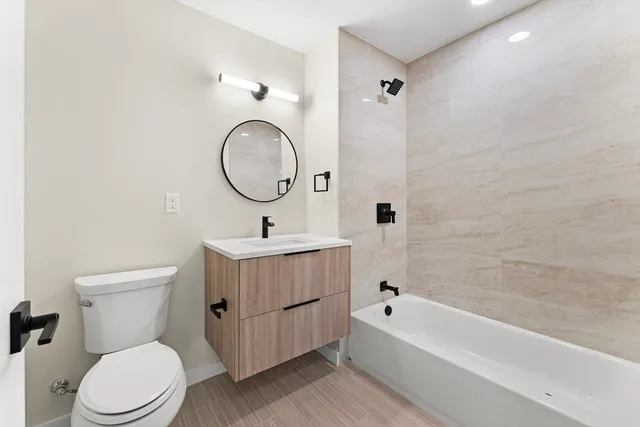 a bathroom with a sink and mirror