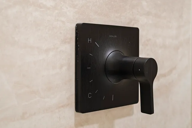 a bathroom with a sink and mirror