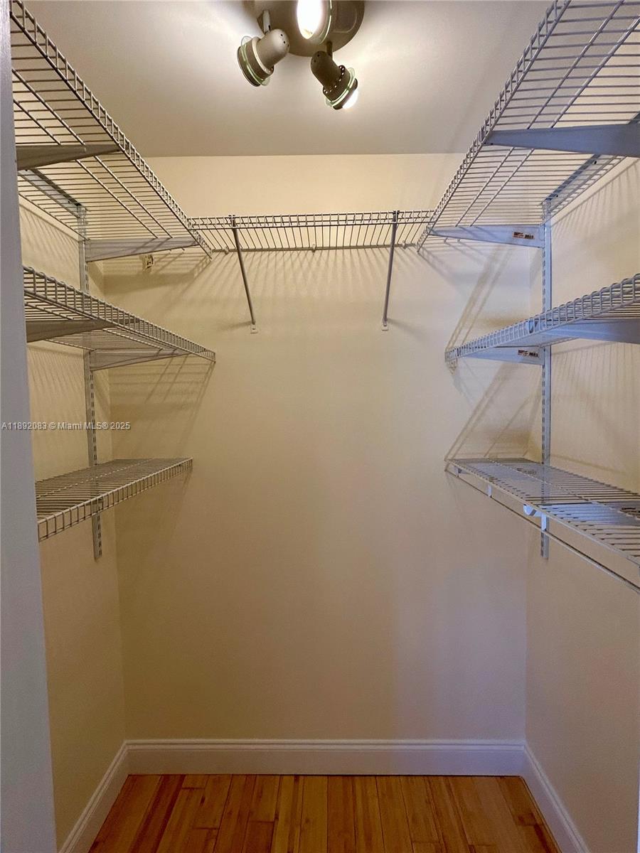 5415 Collins Avenue, Unit 302 Miami Beach, FL 33140 - Photo 21 of 33 a view of a room with racks on the wall